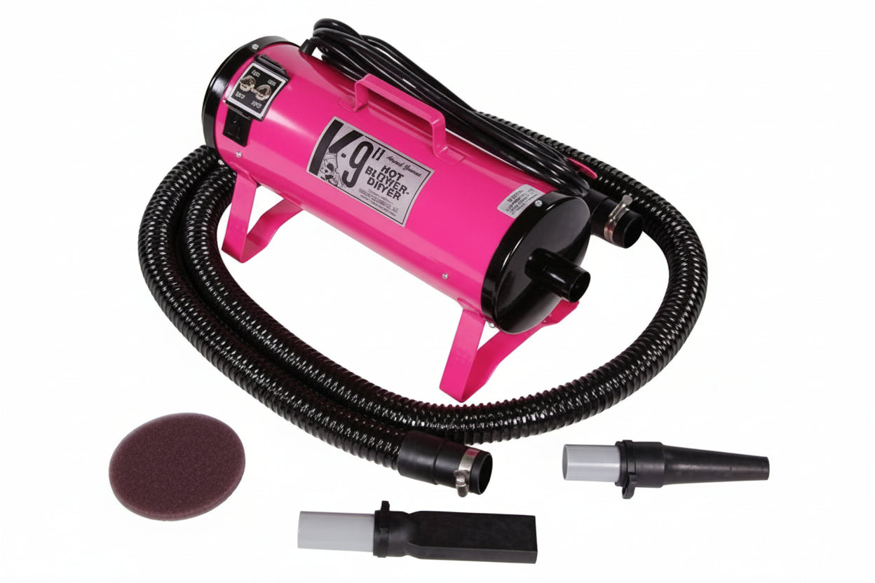 Pink K-9 II dryer with attachments on a white background