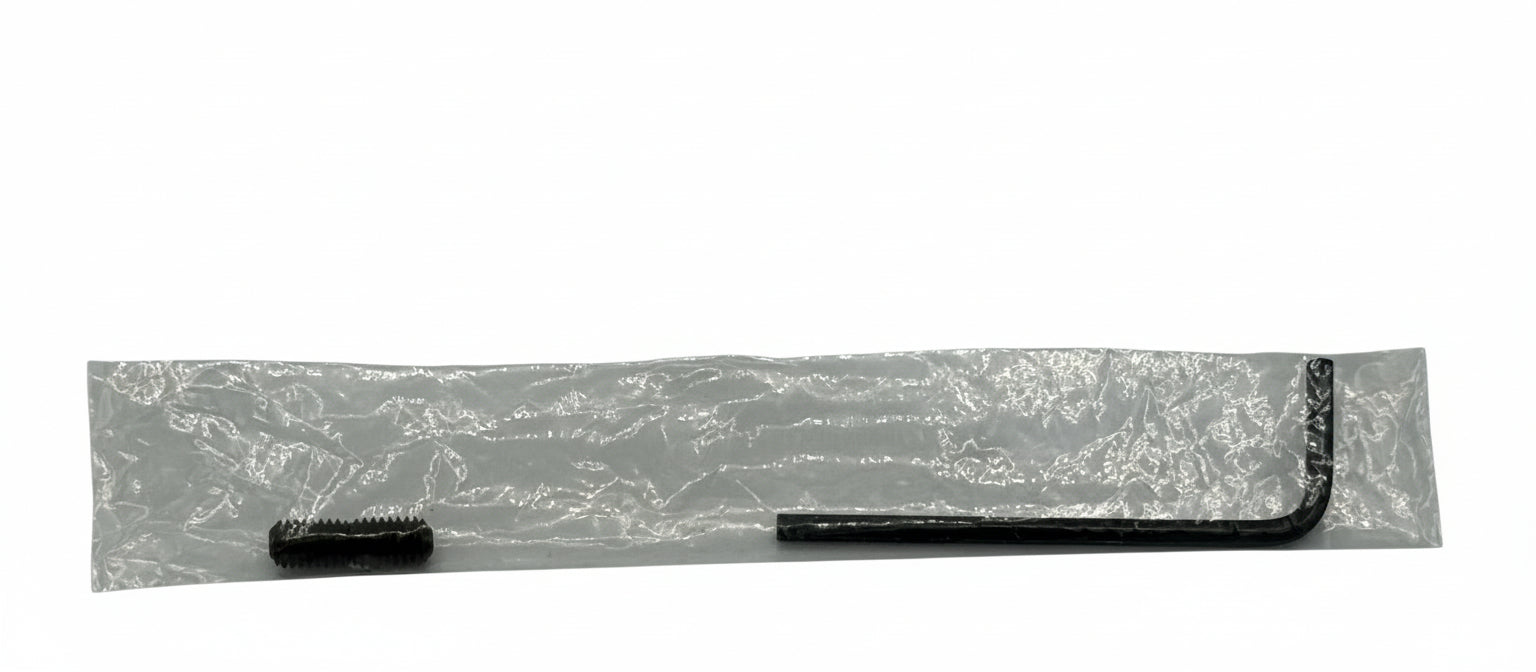 Black hex key and screw in clear plastic packaging on a gray background