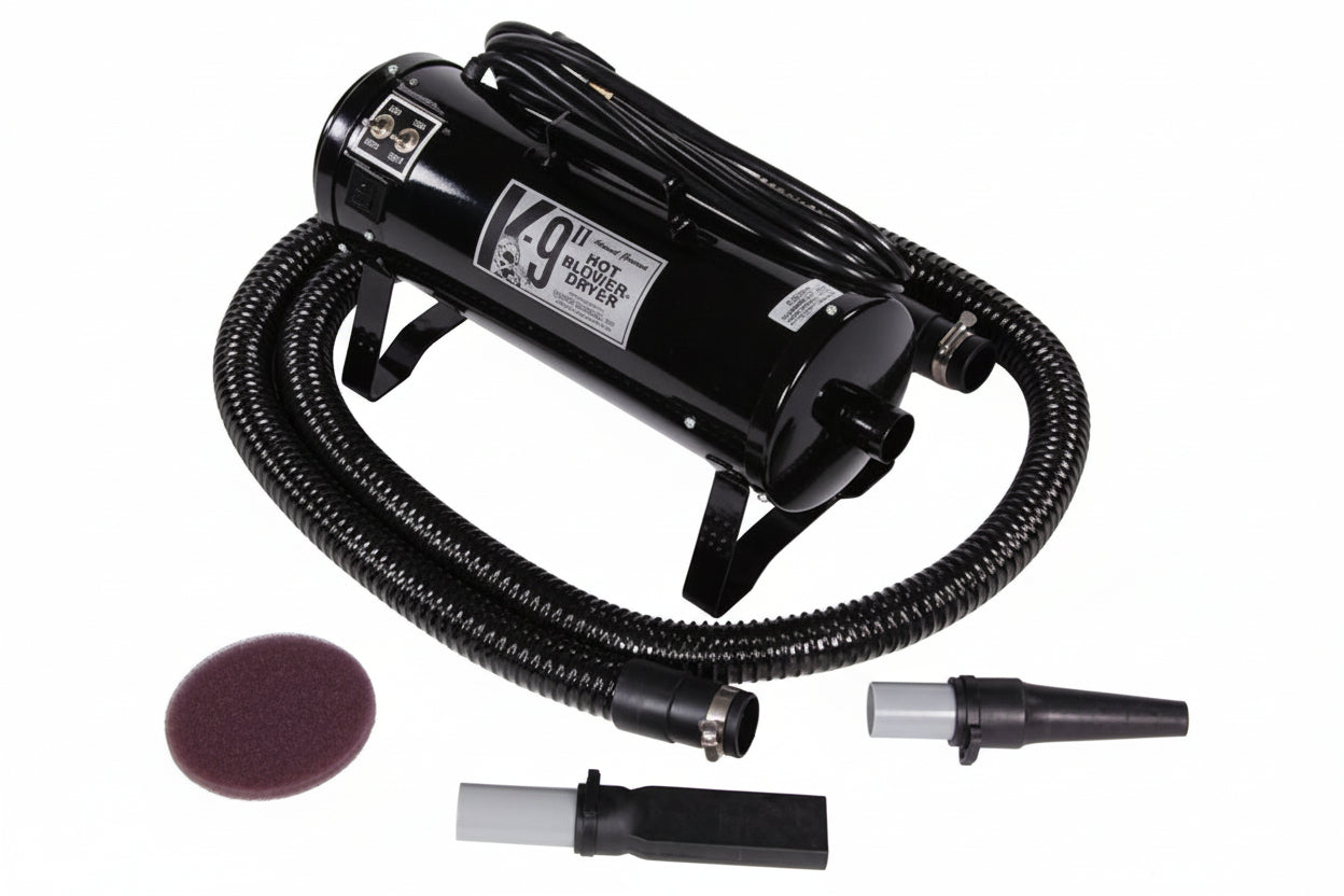 Black K-9 II dryer with attachments on a white background